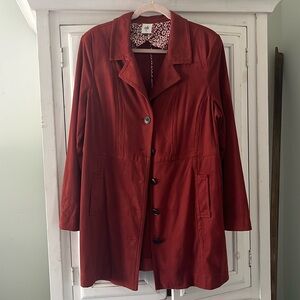 CAbi long faux suede jacket. Color is rust to carnelian.